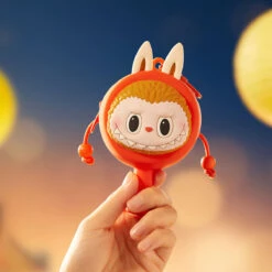 THE MONSTERS Let's Have Fun Together Series-Rattle-drum Earphone Case -Pop Mart 20240808 105733 277552 the monsters let s have fun together series rattle drum earphone case accessories pop mart us scene 2 1200x1200